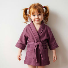 plum purple waffle robe with pockets and waist tie.