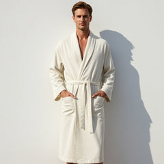 Man in a cream-colored cotton bathrobe