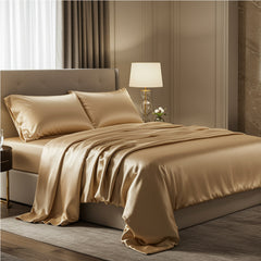 Modern silver grey satin bedding set styled with a white fluted vase and green eucalyptus
