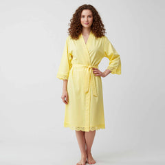 Woman wearing a yellow cotton robe