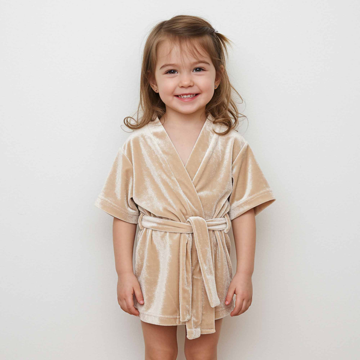 wearing a short-sleeve beige velvet robe with a belt