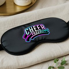 Black satin sleep eye mask with Cheer Passion logo placed on soft fabric