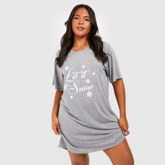 wearing a grey sleep tshirt nightdress featuring the text “Let it Snow” with small snowflake graphics