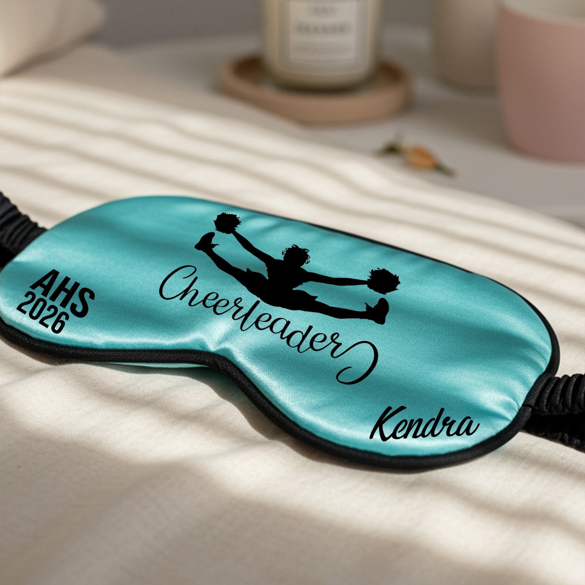  satin sleep eye mask with Cheer Passion logo placed on soft fabric