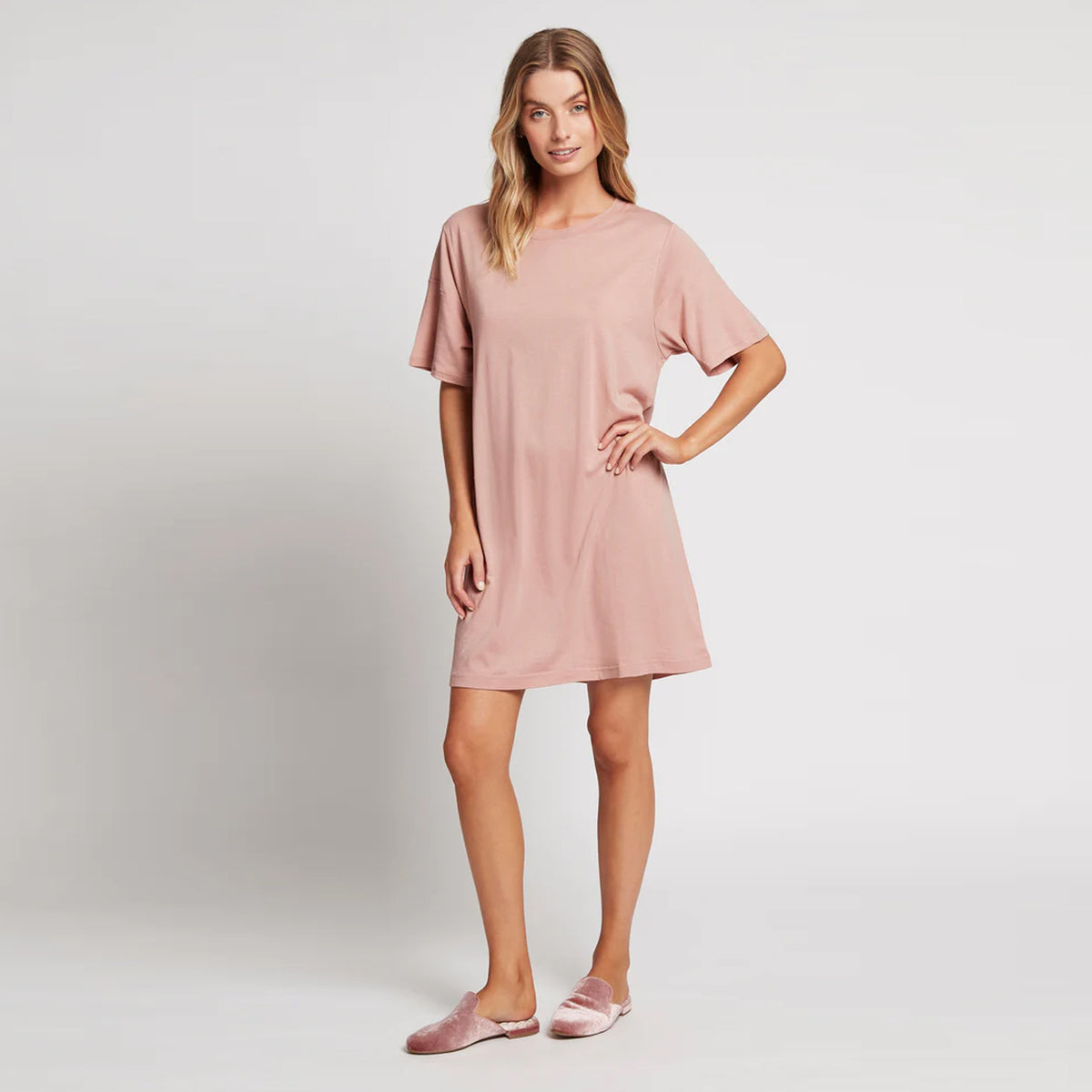 Woman wearing a pink sleep tshirt