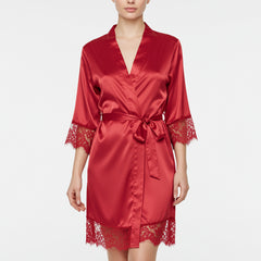 Women’s red satin robe with lace trim and waist tie, front view